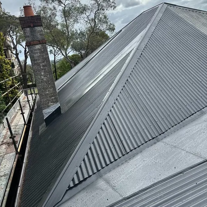 Completed metal roof after Naz Roofing work