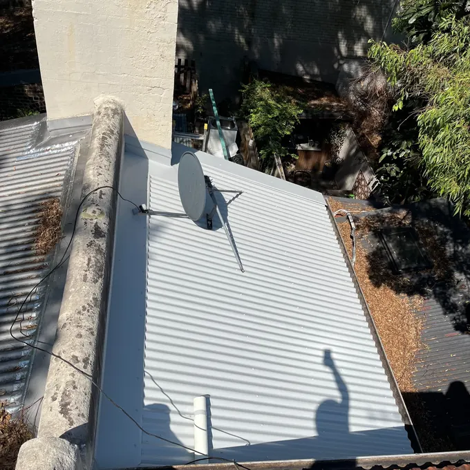 Completed metal roof after Naz Roofing work
